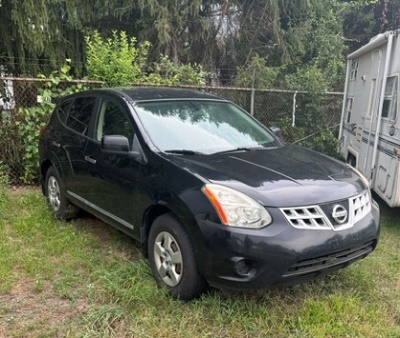 Vehicle parked in outdoor storage
